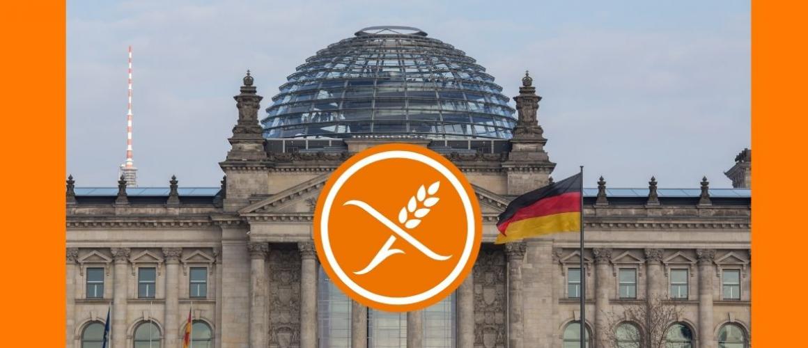 Bild des Bundestages in Berlin mit unseren Logo der durchgestrichenen Ähre